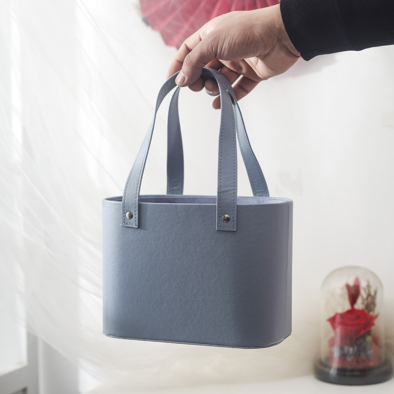 New Oval Leather Holding Bucket Christmas Flower Gift Box Round Portable Leather Basket Flower Arrangement Bucket Hand Gift Bag